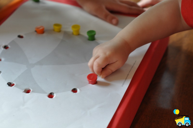 This fun pounding fine motor activity for kids is perfect for active boys to develop their fine motor skills! Click through to give it a try! 
