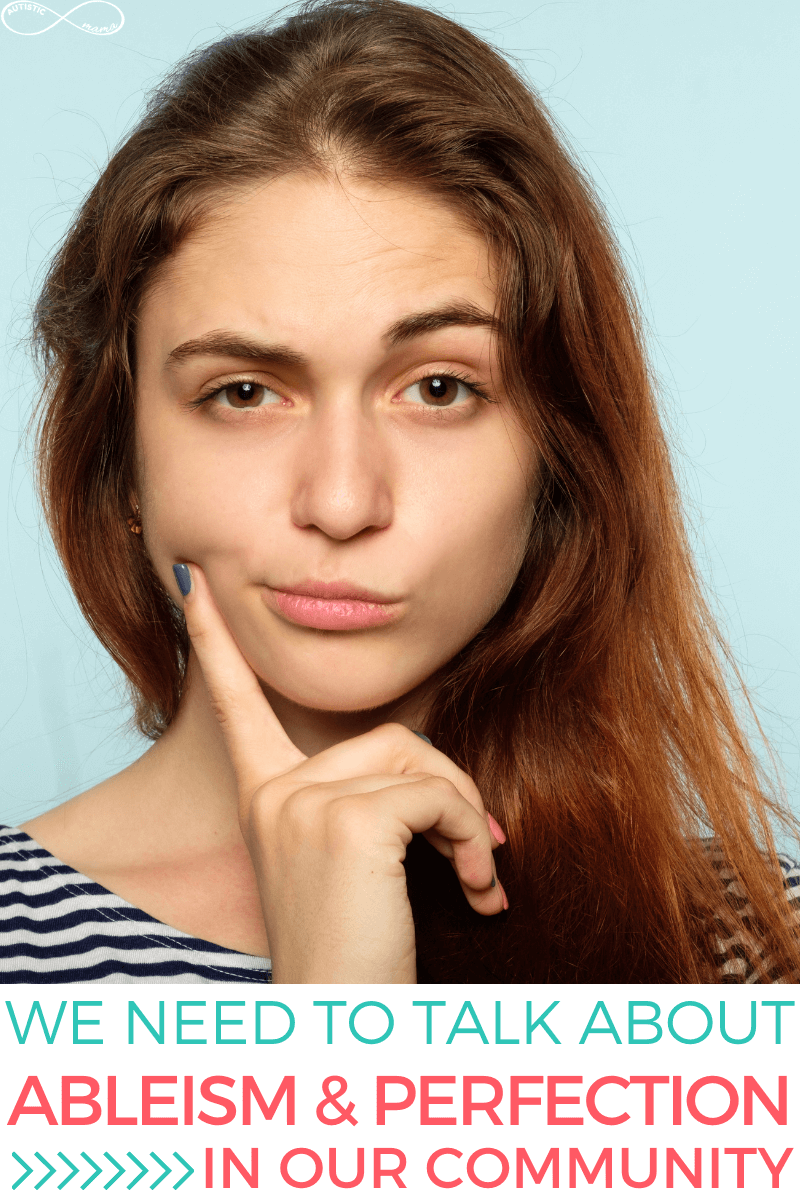 Woman with brown hair faces the camera in front of a blank blue background. She has an eyebrow raised and a finger on the right side of her face. Text reads: We need to Talk About Ableism & Perfection in Our Community.